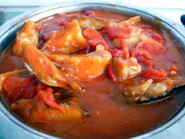 Bacalao con tomate y pimientos